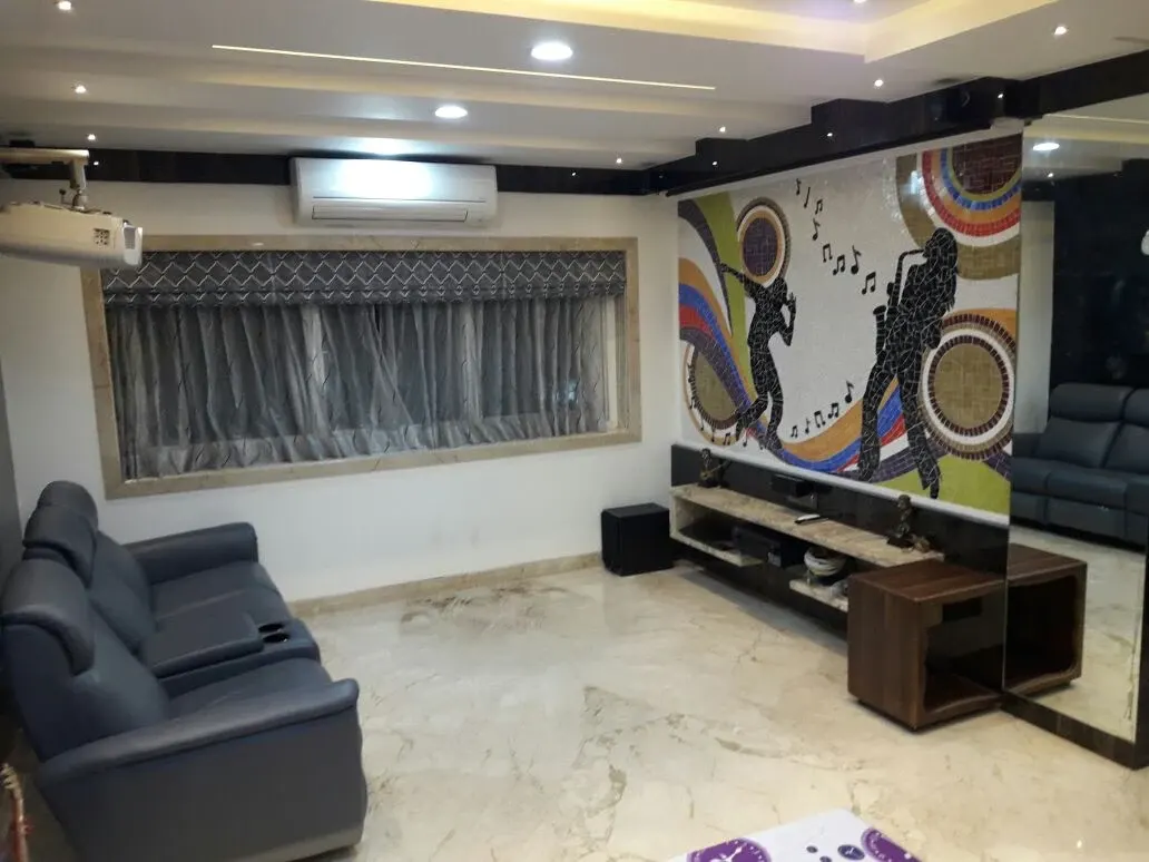 Entertainment room mosaic mural in a Kolkata apartment by Renu Sharma