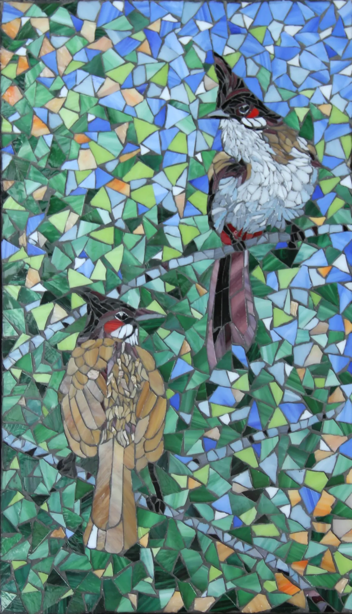 Two red-whiskered bulbuls in glass mosaic