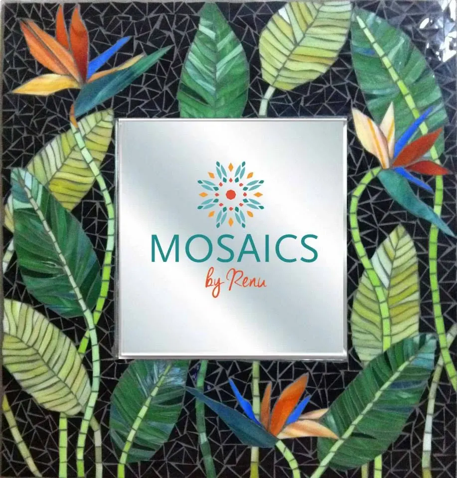 Glass mosaic mirror frame in warm colours