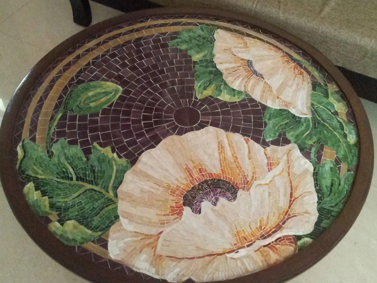 Round mosaic table top with cream poppies
