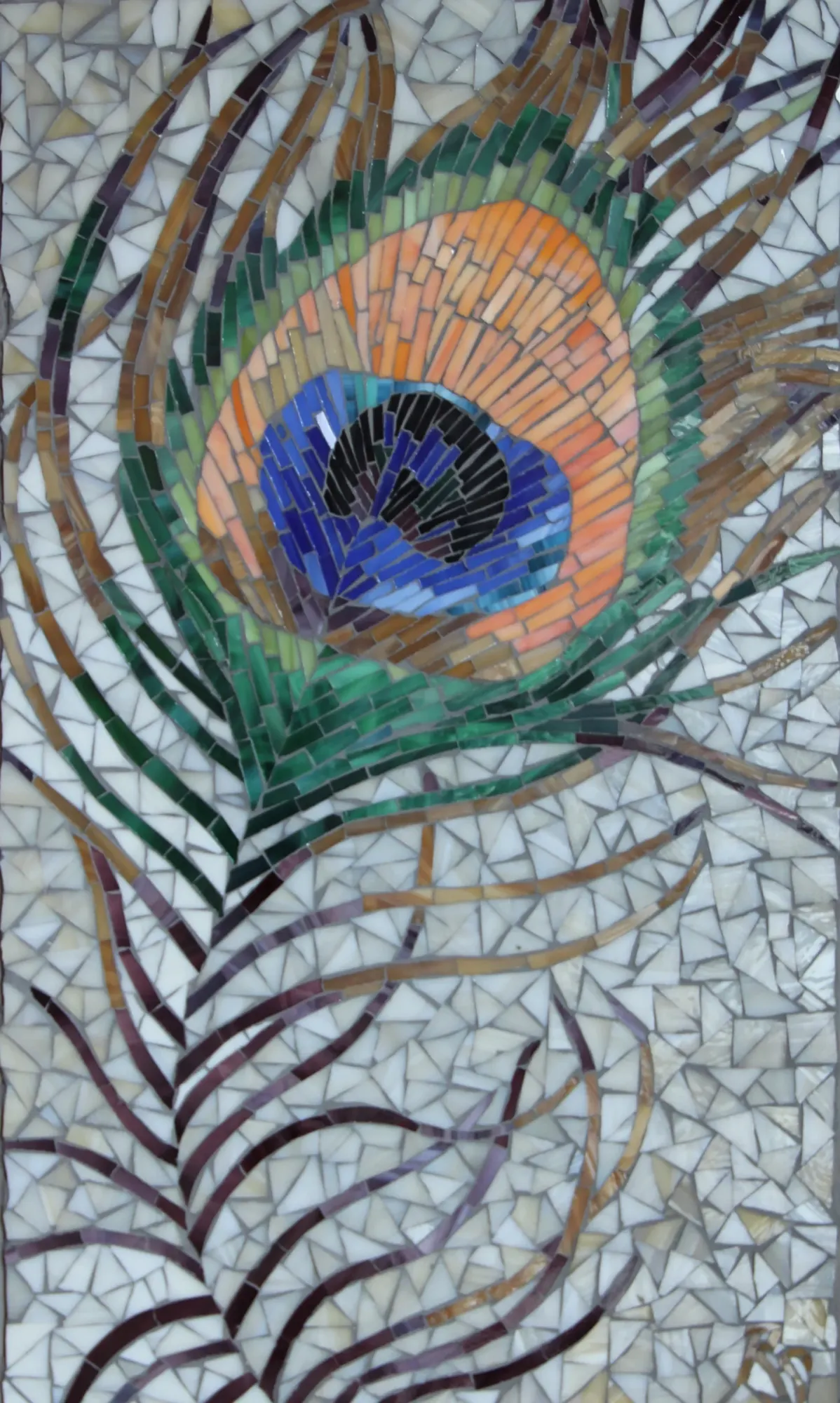 Mosaic of the colours of a peacock feather